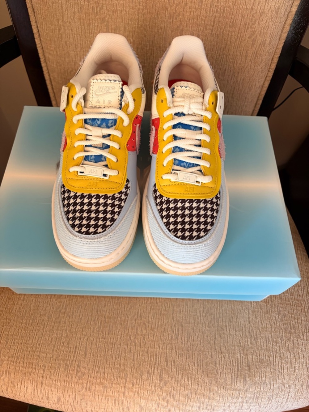 Nike Women's Multicolor Athletic Sneakers with Yellow, Blue & Red Accents